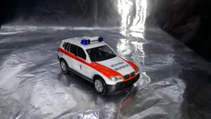 * Herpa 047760  BMW X3S™ Munich Pediatric Rescue Service  1:87 HO Scale - Picture 1 of 3