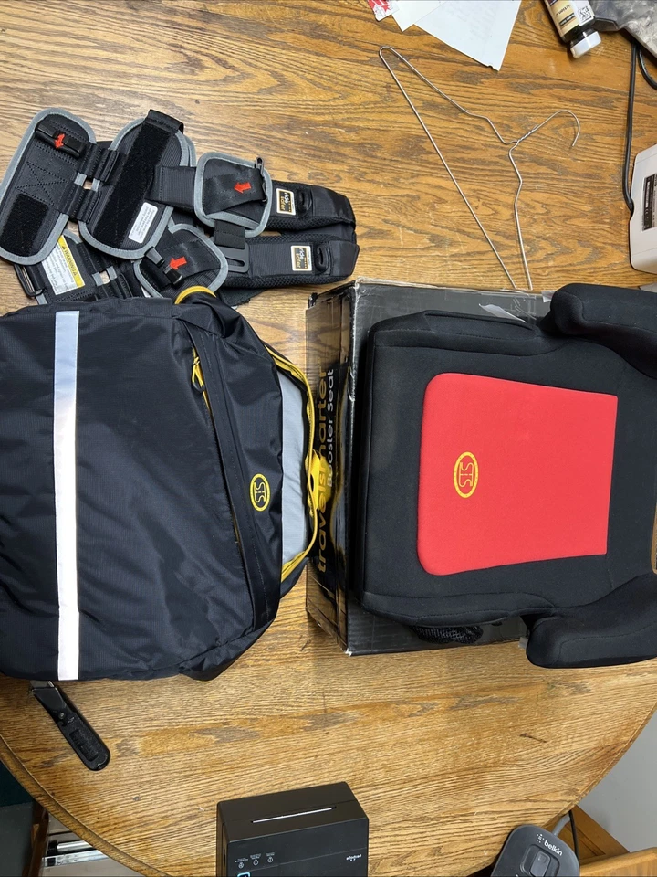 RideSafer - Chaleco de viaje RideSafer negro extra pequeño y caja abierta TravelSmarter Foto 1 de 4