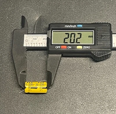 Cantidad. Condensador electrolítico axial 5 ECI 330uf 25v NOS Foto 1 de 3