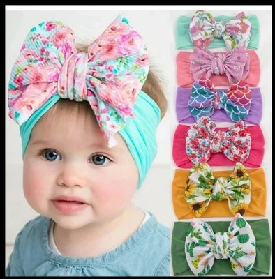 Diadema de conejo floral elástica con moño para el cabello 6 piezas niñas moño-nudo. Foto 1 de 4