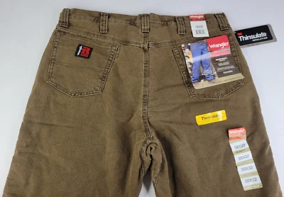 Pantalones de mezclilla Wrangler Riggs aislados de vellón térmico calce relajado para hombre talla 38x32 marrón Foto 1 de 4