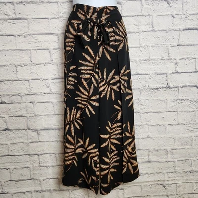 Pantalones de día A New para mujer talla pequeña pierna ancha elástico lazo cintura estampado de hojas tropicales Foto 1 de 4