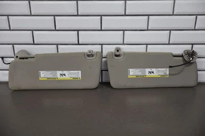 Par de parasoles interiores 13-18 Ram 1500/2500/3500 izquierda/derecha neutral OEM Foto 1 de 4