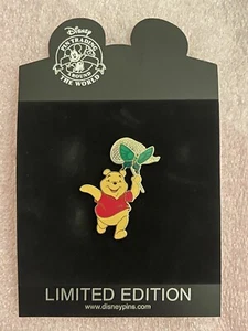 Prendedor de compras Disney Winnie The Pooh Bear Chasing Net Butterfly Series LE 250 - Imagen 1 de 3