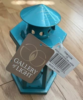 Mini linterna Gallery Of Light Aqua Lighthouse Foto 1 de 2