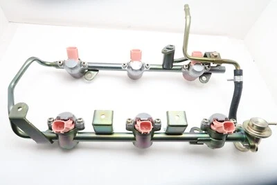 GENUINE OEM Fuel Injector for 2000-2004 Nissan Xterra 3.0 3.3L V6 WITH RAIL - Image 1 of 4