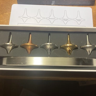 Raro muelle superior de metal ForeverSpin, 5 tapas, base giratoria y una caja Foto 1 de 4