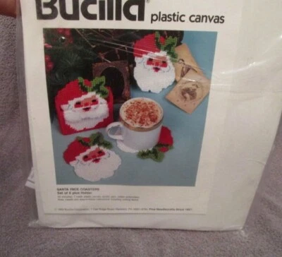 Bucilla Santa Face Coasters Needlepoint Kit Makes 7 With Holder Plastic Canvas - Image 1 of 4