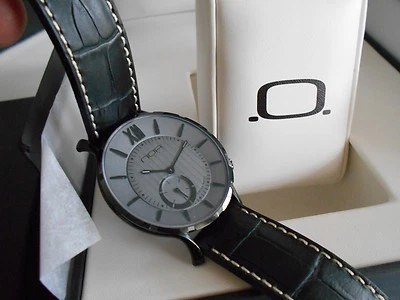Nuevo N.O.A. Reloj de cuarzo suizo delgado 18,60 MSLQ-011 esfera gris. Caja y papeles Foto 1 de 4
