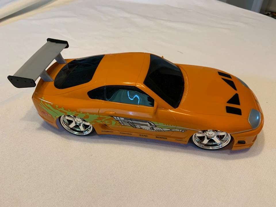 Fast & Furious Orange 1:16 Brian's 1995 Toyota Supra R/C Toy Car USB Jada Toys - Image 1 of 4