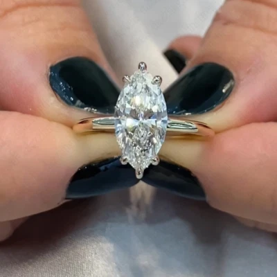 Anillo de compromiso halo oculto marquesa moissanita de 2,50 quilates oro sólido de 14 quilates en dos tonos Foto 1 de 4