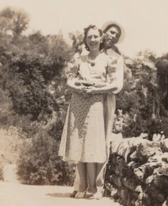 1933 Couple Outdoors Woman Patterned Dress Man Hat Affectionate Stance Portrait - Picture 1 of 3