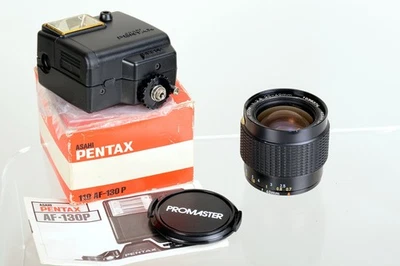 Pentax-110 Zoom 1:2.8 20-40mm Lens + AF-130P Flash.  Tested.  374 - Image 1 of 4