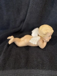 Pre Owned Blond Ceramic Bisque Cherub Angel Laying On Belly Thinking - Picture 1 of 5