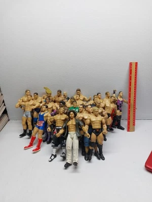 WWE Action Figure Lot of 26 Mattel Wrestling Figures As Shown Played With F - Image 1 of 4