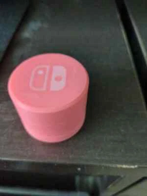 Estuche redondo con soporte para cartucho de juego Nintendo Switch - Tiene capacidad para 8 juegos bloqueo giratorio Foto 1 de 4