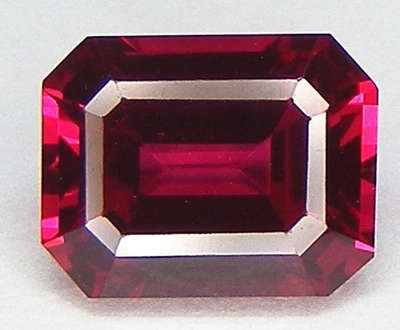 1.89CT. EXCELLENT EMERALD CUT 8x6 MM. PIGEON BLOOD RED RUBY LAB CORUNDUM - Image 1 of 3