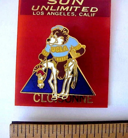 VINTAGE UCLA BRUINS BEAR MASCOT RIDING A DEFEATED USC TROJAN HORSE SOUVENIR PIN Cover