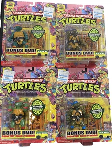Lote de 4 figuras Teenage Mutant Ninja Turtles 25 aniversario TMNT NUEVO con DVD de bonificación - Imagen 1 de 8