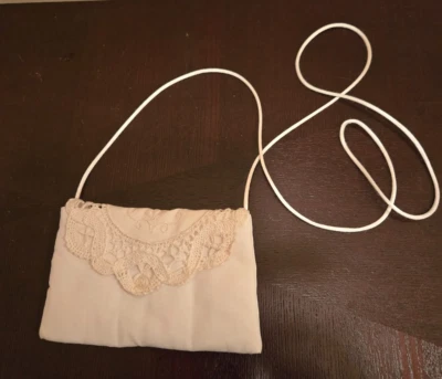 DISEÑOS DE RENDEZVOUS NEW ORLEANS MINI BOLSO DE HOMBRO CON OJALES DE LINO Foto 1 de 4