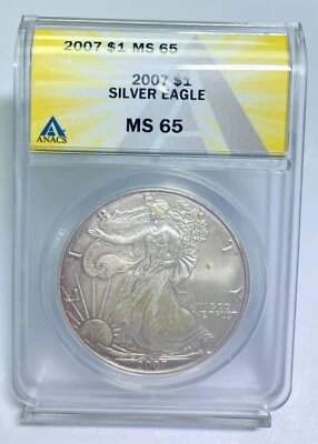 2007 $1 American Silver Eagle ANACS MS 65 Toned - Image 1 of 2