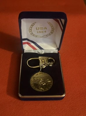 1984 Los Angeles Summer Games RARE Discus Gold Keychain W/ Original Display Box - Image 1 of 2