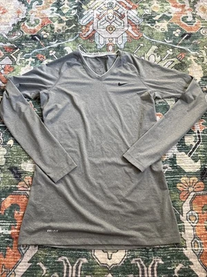 Camisa de compresión Nike Pro Combat Dri-Fit para mujer talla M gris cuello en V manga larga Foto 1 de 4