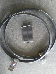 Thick slick tires size (2) 700 x 25 c. (1) pure cycles pedal straps & kit - Picture 1 of 8