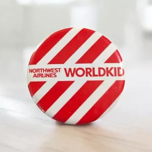 Vintage Pinback NORTHWEST AIRLINES WORLDKID Button Aviation Pin - Picture 1 of 2