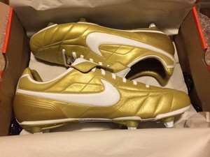 white and gold nike soccer cleats