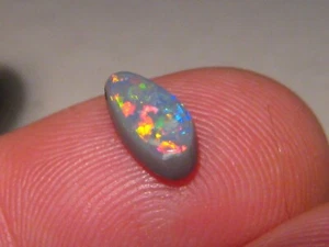  .80  ct  Solid Black Opal from Lightning Ridge.  - Picture 1 of 11