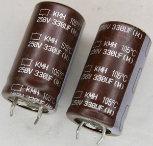 Condensador electrolítico a presión 330uF 250V 105°C 22x40 mm KMH Chemi-Con Quan 2 - Imagen 1 de 2