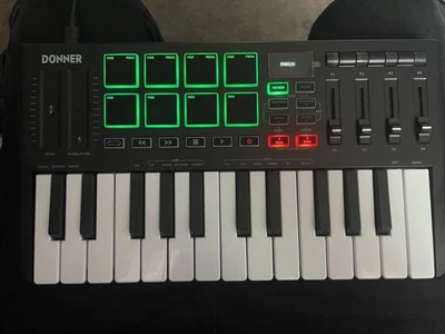 🎹Controlador de teclado MIDI Donner DMK25 Pro blanco con software y cursos en línea Foto 1 de 4