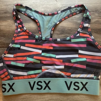 Sujetador deportivo Victoria’s Secret VSX talla M rosa azulado estampado geométrico espalda cruzada Foto 1 de 4