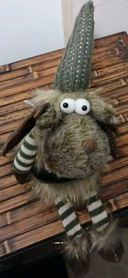 Chaleco y falda de felpa dorado brillante con tope de puerta de alce de ojos blancos  Foto 1 de 4