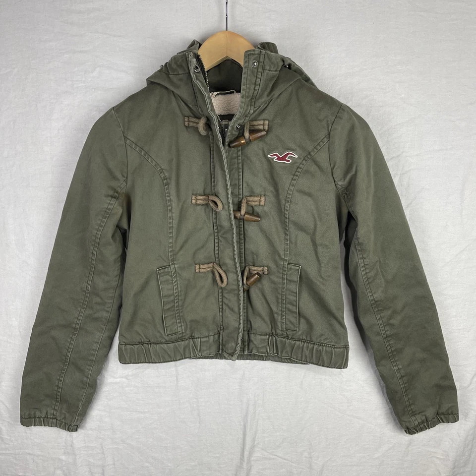 Chaqueta Hollister Mujer Mediana Verde Sherpa Forrada Palanca Logo Con Capucha Parka Cálida Foto 1 de 4