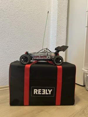 Reely Carbon Fighter 1:10 4x4 Brushless + Transportkoffer, Teile, Räder + 2 Akku - Bild 1 von 4
