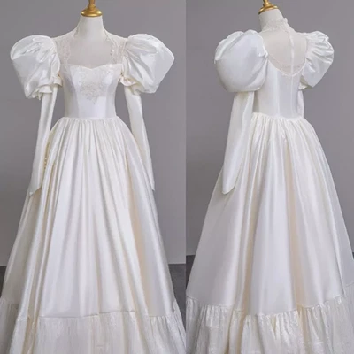 Vestidos de novia victorianos satinados manga larga largo completo línea A vestido de novia Foto 1 de 4