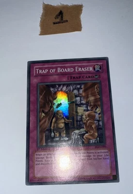 Yugioh Trap of Board Eraser PGD-099 Super Rare 1st Edition (LP) - Image 1 of 4