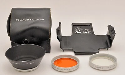 POLAROID TRIPOD MOUNT #111, LENS SHADE, TWO FILTERS, AND KIT CASE - Image 1 of 4