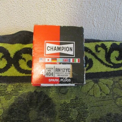 New 4 Pack. Champion Copper Plus Spark Plugs. 404~~ RN12YC - Image 1 of 3