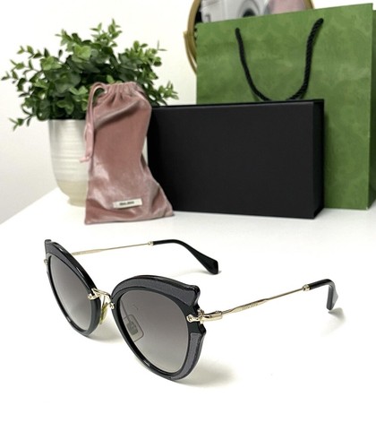 Occhiali da sole autentici Miu Miu SMU 05S moda occhio di gatto oversize sfumato