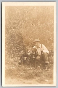 Postcard: Vintage Portrait of Boy with Gun and Dogs, RPPC, KRUXU, Unposted - Picture 1 of 2