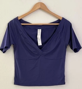 Top Fabletics Púrpura Natasha Recortado Ajustado Elastizado Manga Corta Medio Activo - Imagen 1 de 14