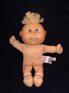 brown curly haired cabbage patch doll