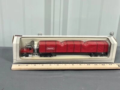 彼得比尔特标志 Peterbilt 385 带防水布拖车 1: 64 规格铸造卡车 33006 全新带盒 — 第 1/4 张图片