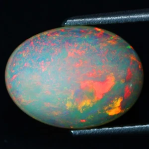 3.45 Ct Oval 13.7 x 10.2 MM Rainbow Color Ethiopia Natural Rainbow Fire Opal - Picture 1 of 5