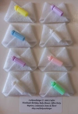 26 mini pañales de fieltro hechos a mano para favores de baby shower, juegos en varios colores Foto 1 de 4
