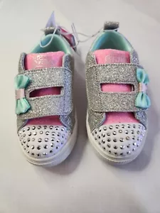 Tenis Sport by Skechers Niña Bebé Estrellas de Cristal Iluminadas Corazones Plateados Talla 7 - Imagen 1 de 4