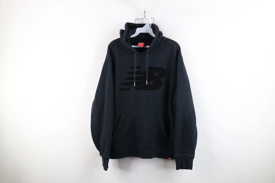 Sudadera con Capucha Parche Fieltro Logo Grande Desteñido De Colección New Balance Para Hombres Negra Foto 1 de 4